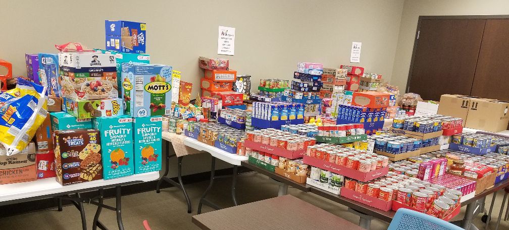 Heartland Staff Donates Record 7,585 Items to Kansas Food Bank
